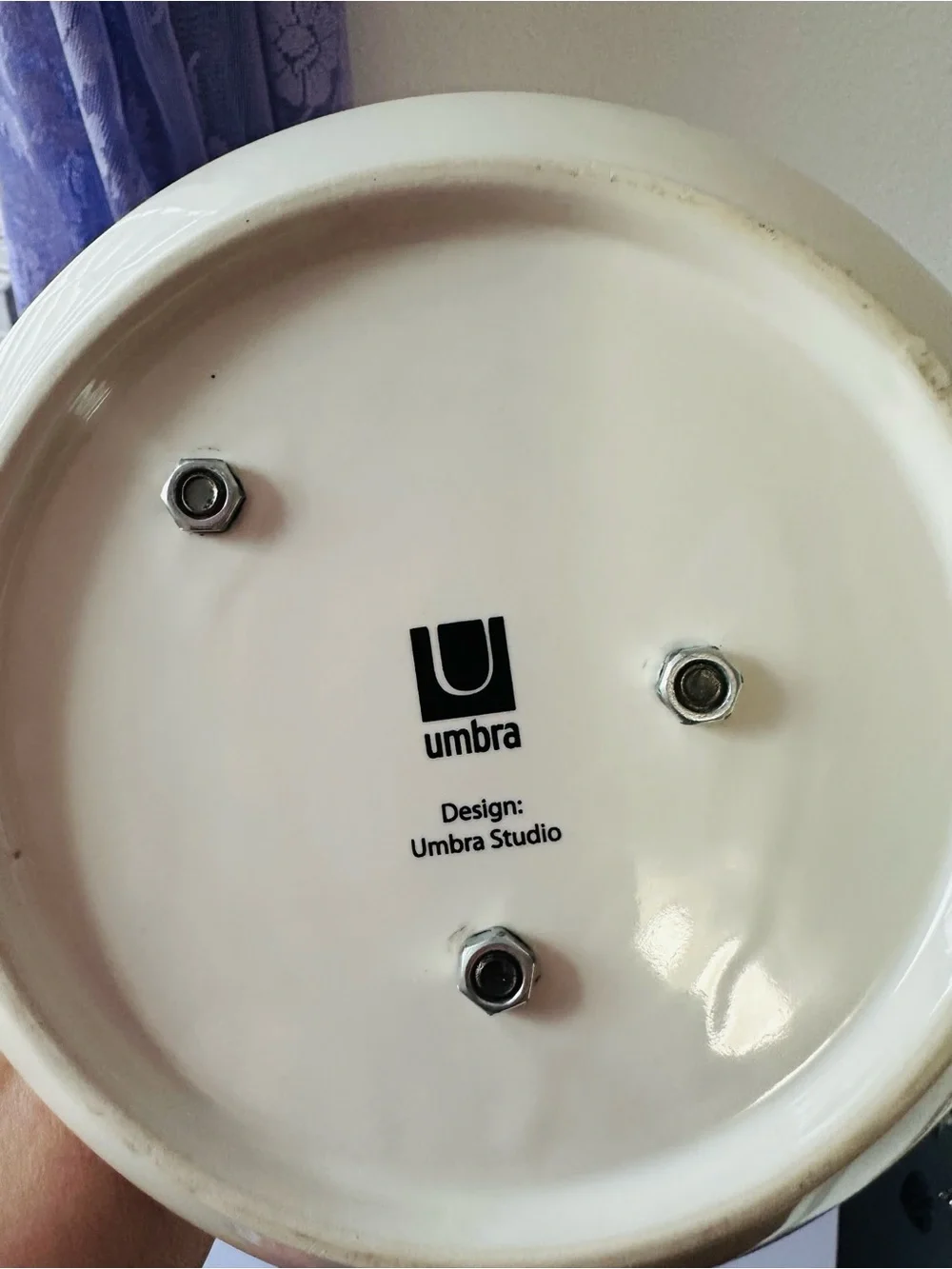 Umbra white ceramic base with black logo